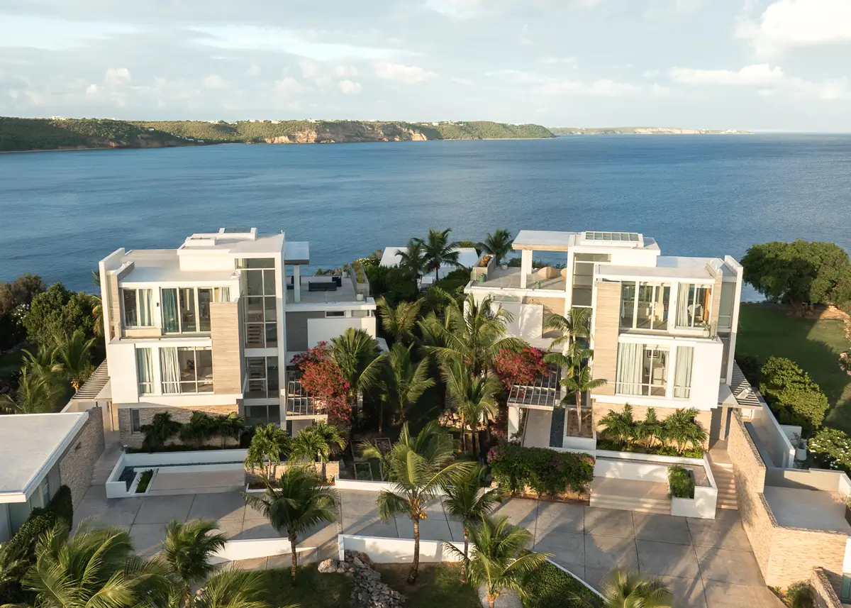ÀNI Anguilla luxury private resort villas overlooking the Caribbean Sea, surrounded by tropical gardens