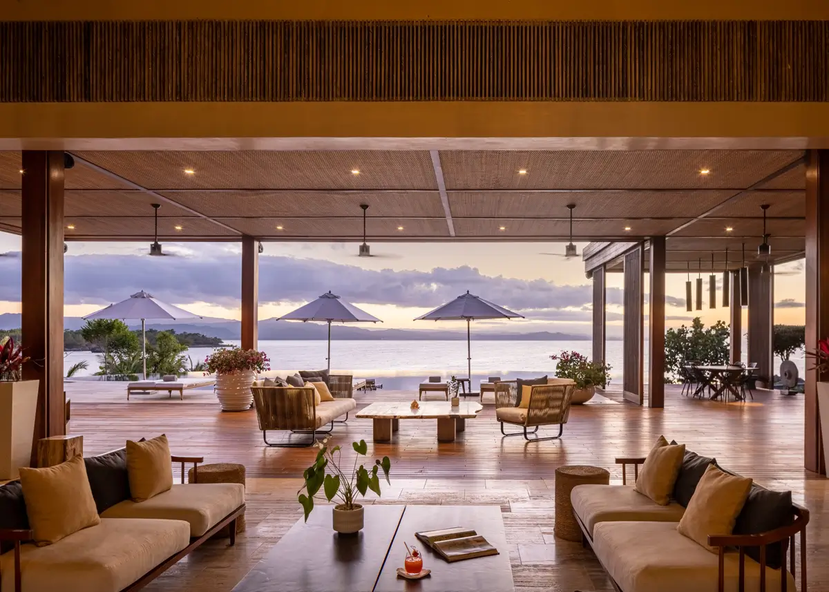 ÀNI Dominican Republic luxury private resort with open-air oceanfront lounge overlooking the Caribbean at sunset